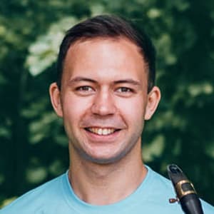 Course author with a saxophone